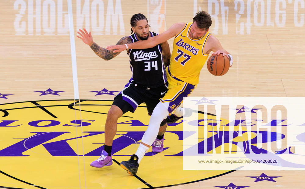 Luka Doncic 77 of the Los Angeles Lakers is fouled by Emanuel Sharp 34 of the Sacramento Kings during a preseason NBA, Basketball Herren, USA game on Thursday October 8, 2026 at Crypto.com Arena in Los Angeles, California. JAVIER ROJAS PI Los Angeles USA - ZUMAp124 20261008_zaa_p124_020