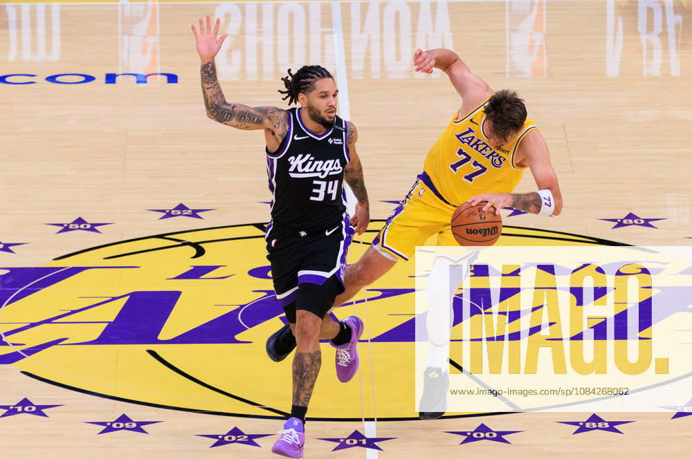 Luka Doncic 77 of the Los Angeles Lakers is fouled by Emanuel Sharp 34 of the Sacramento Kings during a preseason NBA, Basketball Herren, USA game on Thursday October 8, 2026 at Crypto.com Arena in Los Angeles, California. JAVIER ROJAS PI Los Angeles USA - ZUMAp124 20261008_zaa_p124_022