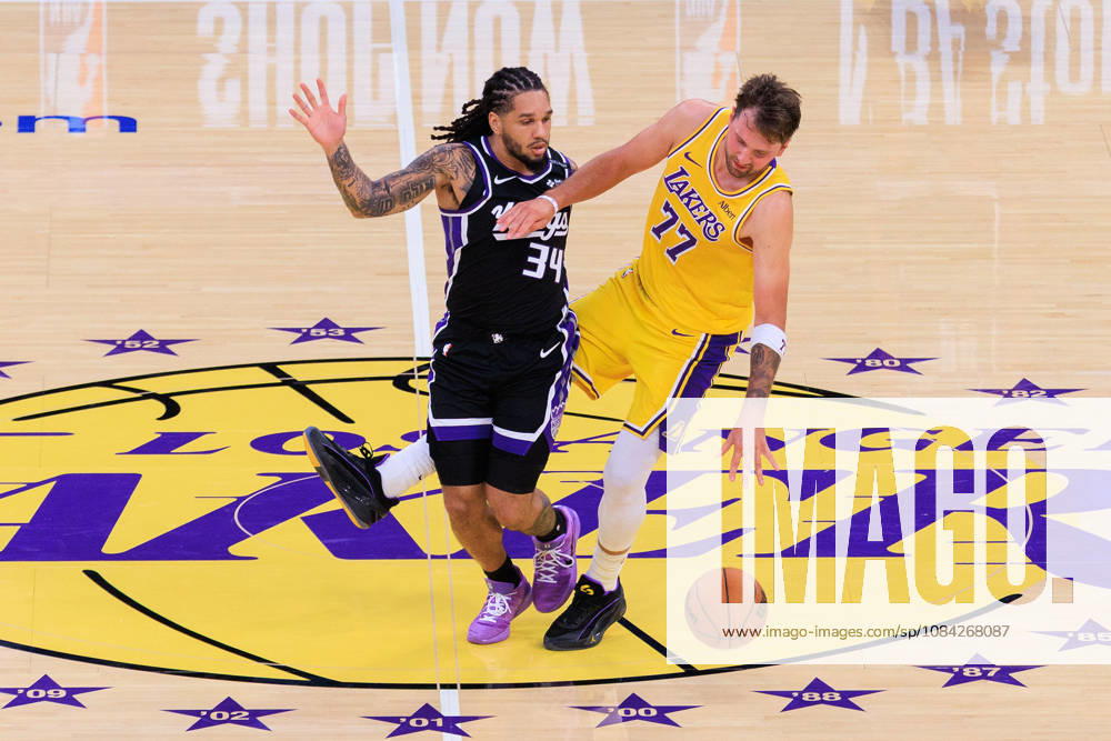 Luka Doncic 77 of the Los Angeles Lakers is fouled by Emanuel Sharp 34 of the Sacramento Kings during a preseason NBA, Basketball Herren, USA game on Thursday October 8, 2026 at Crypto.com Arena in Los Angeles, California. JAVIER ROJAS PI Lakers Vs. Kings - ZUMAp124 20261008_zaa_p124_021