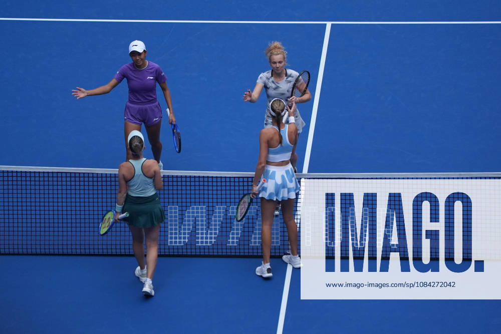 (261009) -- BEIJING, Oct. 9, 2026 -- Katerina Siniakova (top R) Zhang Shuai (top L) greet Storm Hunter (bottom L) Kristina Mladenovic after the women s doubles quarterfinal match between Katerina Siniakova (the Cezch Republic) Zhang Shuai (China) and Storm Hunter (Australia) Kristina Mladenovic (France) at 2026 China Open tennis tournament in Beijing, China, Oct. 9, 2026. ) (SP)CHINA-BEIJING-TENNIS-CHINA OPEN-WOMEN S DOUBLES (CN) XiexHan