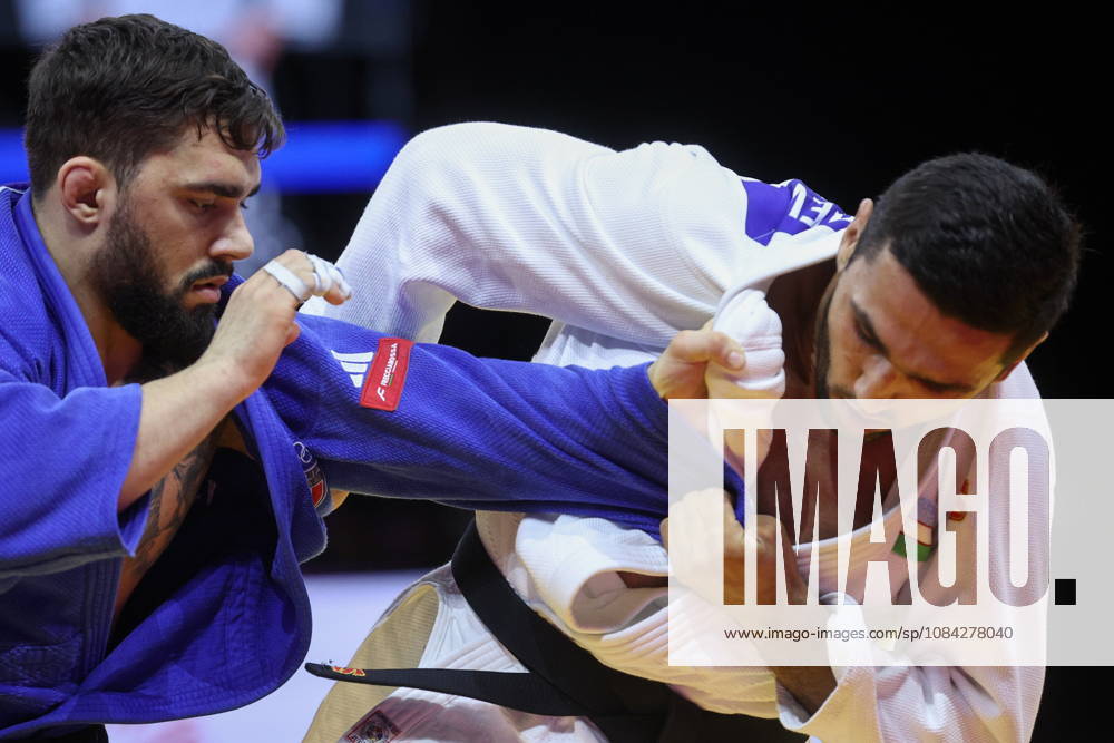 AZERBAIJAN, BAKU - OCTOBER 9, 2026: Gennaro Pirelli (L) of Italy and Tulkinbek Turdiev of Uzbekistan compete in their -100 kg bout as part of the 2026 World Judo Championships at the National Gymnastics Arena. Mikhail Sinitsyn TASS 98997264