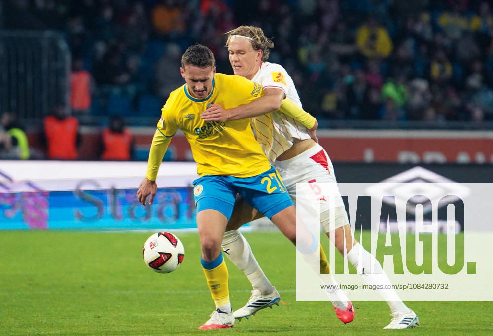 Deutschland: Fussball 2. Bundesliga 2026 2027, 7. Spieltag - Eintracht Braunschweig vs Holstein Kiel - Eintracht-Stadion (Braunschweig): im Zweikampf Jan Urbich (Eintracht Braunschweig, 27) Noah Madsen (Holstein Kiel, 5)