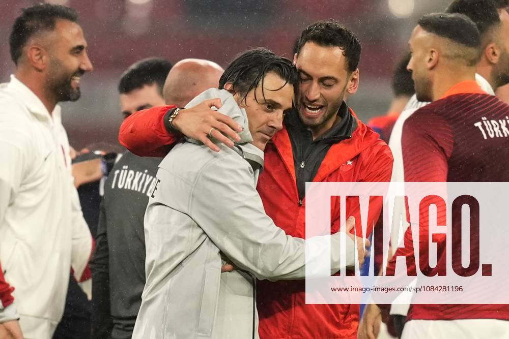 Turkey s Hakan Calhanoglu and Turkey s head coach Vincenzo Montella final celebration during the Euro 2024 soccer match between Austria and Turkey at the Red Bull Arena -Round of 16, Leipzig, Germany - Tuesday July 02, 2024. - Soccer .