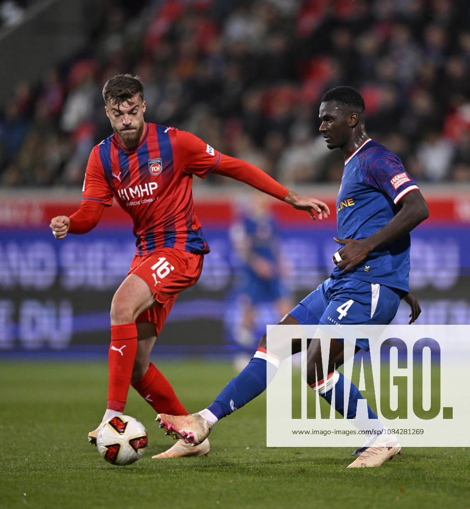 Zweikampf, Aktion Maxwell Gyamfi 1. FC Kaiserslautern FCK (04) gegen Julian Niehues 1. FC Heidenheim 1846 FCH (16) 1. FC Heidenheim 1846 FCH vs 1. FC Kaiserslautern 09.10..2026 DFL REGULATIONS PROHIBIT ANY USE OF PHOTOGRAPHS AS IMAGE SEQUENCES AND OR QUASI-VIDEO 1. FC Heidenheim 1846 FCH vs 1. FC Kaiserslautern