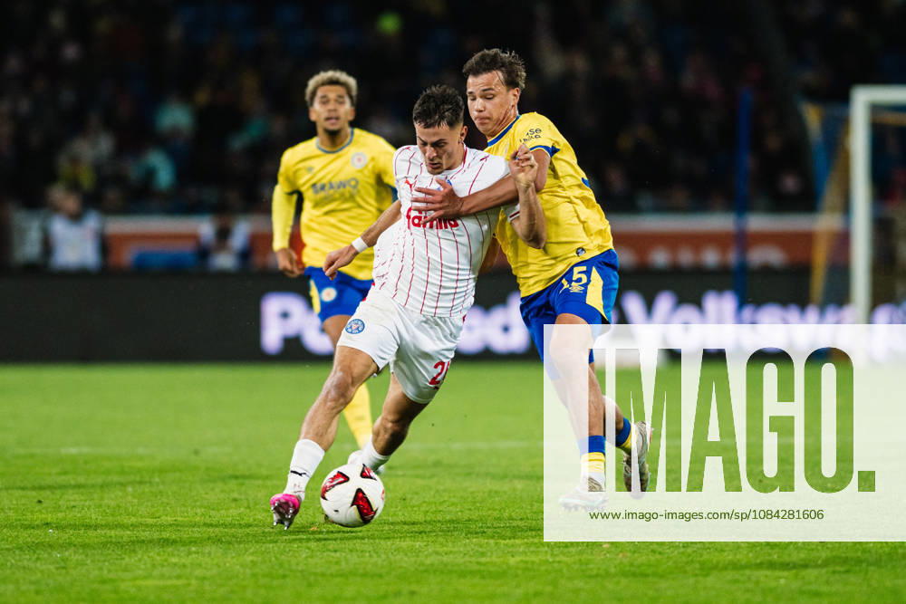 2. Bundesliga: Eintracht Braunschweig vs. Holstein Kiel, 09.10.2026 Adrian Kapralik (Holstein Kiel, 20) gegen Max Marie (Eintracht Braunschweig, 15) im Zweikampf; Fußball, 2. Bundesliga, 7. Spieltag: Eintracht Braunschweig vs. Holstein Kiel am 09.10.2026 im Eintracht-Stadion, Braunschweig DFL REGULATIONS PROHIBIT ANY USE OF PHOTOGRAPHS AS IMAGE SEQUENCES AND OR QUASI-VIDEO.