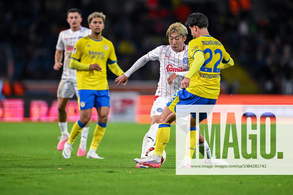 Fussball, 2. Bundesliga, Eintracht Braunschweig - Holstein Kiel, Hiroki Sekine (Holstein Kiel), Fabio Di Michele Sanchez (Eintracht Braunschweig) xRHR-FOTO DEx