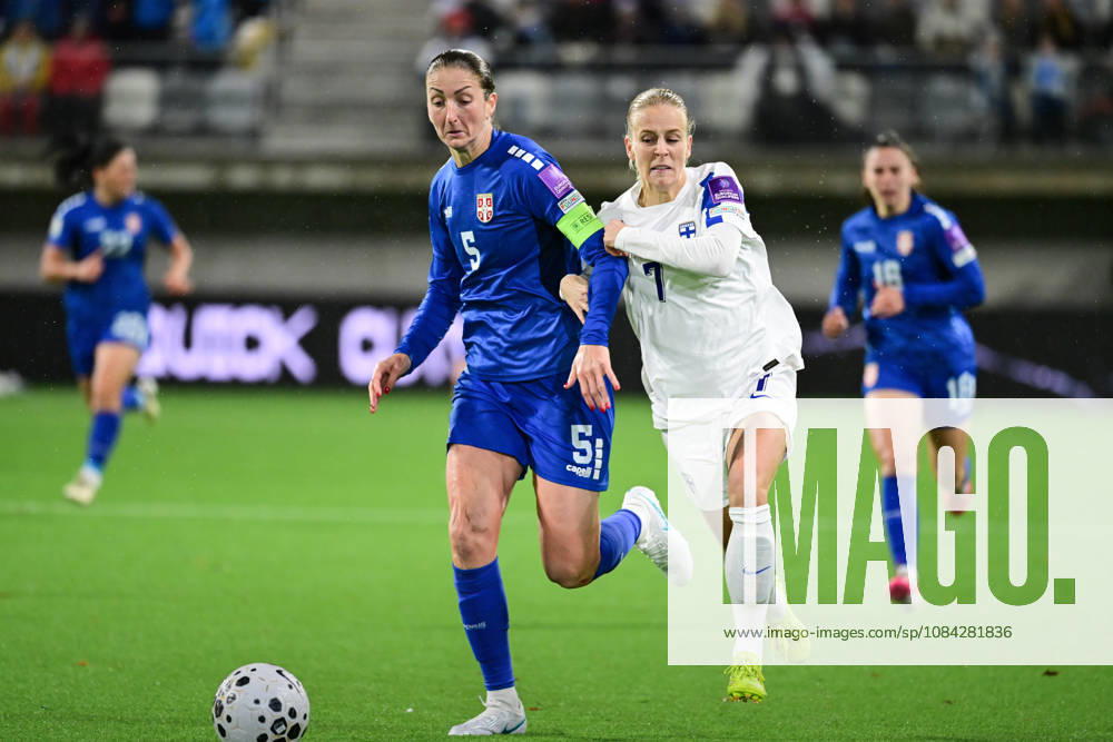Violeta Slovic of Serbia (left) and Adelina Engman of FInland in action during the women s World Cup European Qualifying play-off round first leg football match between Finland and Serbia in Tampere, Finland, on October 9, 2026, ahead of the 2027 FIFA Women s World Cup. - ANSSI TAKALA Tampere Finland HU-pJ5-m9Zw