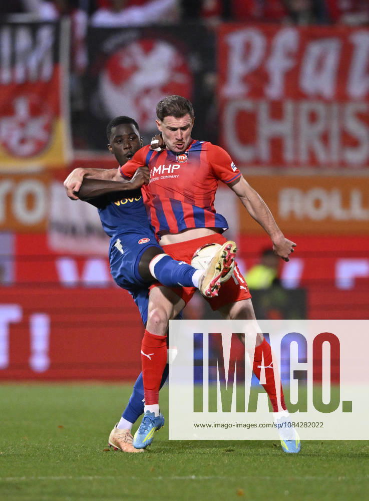 Zweikampf, Aktion Budu Zivzivadze Siwsiwadse 1. FC Heidenheim 1846 FCH (11) gegen Maxwell Gyamfi 1. FC Kaiserslautern FCK (04) 1. FC Heidenheim 1846 FCH vs 1. FC Kaiserslautern 09.10..2026 DFL REGULATIONS PROHIBIT ANY USE OF PHOTOGRAPHS AS IMAGE SEQUENCES AND OR QUASI-VIDEO 1. FC Heidenheim 1846 FCH vs 1. FC Kaiserslautern