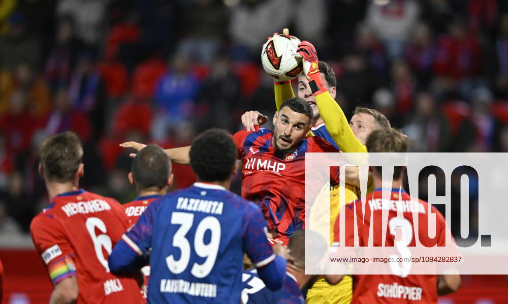 Strafraumszene, Torraumszene Torwart Thomas Daehne 1. FC Heidenheim 1846 FCH (33) Oualid Mhamdi 1. FC Heidenheim 1846 FCH (22) Thierry Tazemeta 1. FC Kaiserslautern FCK (39) Jan Schoeppner 1. FC Heidenheim 1846 FCH (03) Patrick Mainka 1. FC Heidenheim 1846 FCH (06) 1. FC Heidenheim 1846 FCH vs 1. FC Kaiserslautern 09.10..2026 DFL REGULATIONS PROHIBIT ANY USE OF PHOTOGRAPHS AS IMAGE SEQUENCES AND OR QUASI-VIDEO 1. FC Heidenheim 1846 FCH vs 1. FC Kaiserslautern