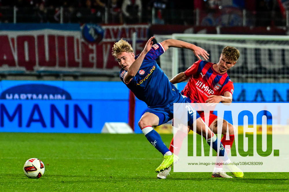 GER, Fussball, Herren, 2. Bundesliga, 7. Spieltag, 1. FC Heidenheim vs 1. FC Kaiserslautern Mika Haas (Kaiserslautern, 22), Jan Schöppner (Heidenheim, 3) Heidenheim Voith-Arena Baden-Württemberg Deutschland