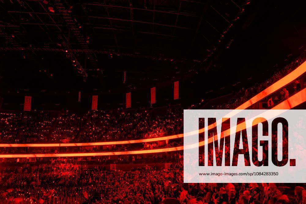 COLOGNE, GERMANY - 9 OCTOBER, 2026: (Editor note: used red filter) General view stands of Lanxes Arena - The PENNY DEL Ice hockey, Eishockey match Koelner Haie vs. Schwenninger Wild Wings at LANXESS arena.