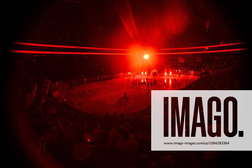 COLOGNE, GERMANY - 9 OCTOBER, 2026: (Editor note: used red filter) General view pre show - The PENNY DEL Ice hockey, Eishockey match Koelner Haie vs. Schwenninger Wild Wings at LANXESS arena.