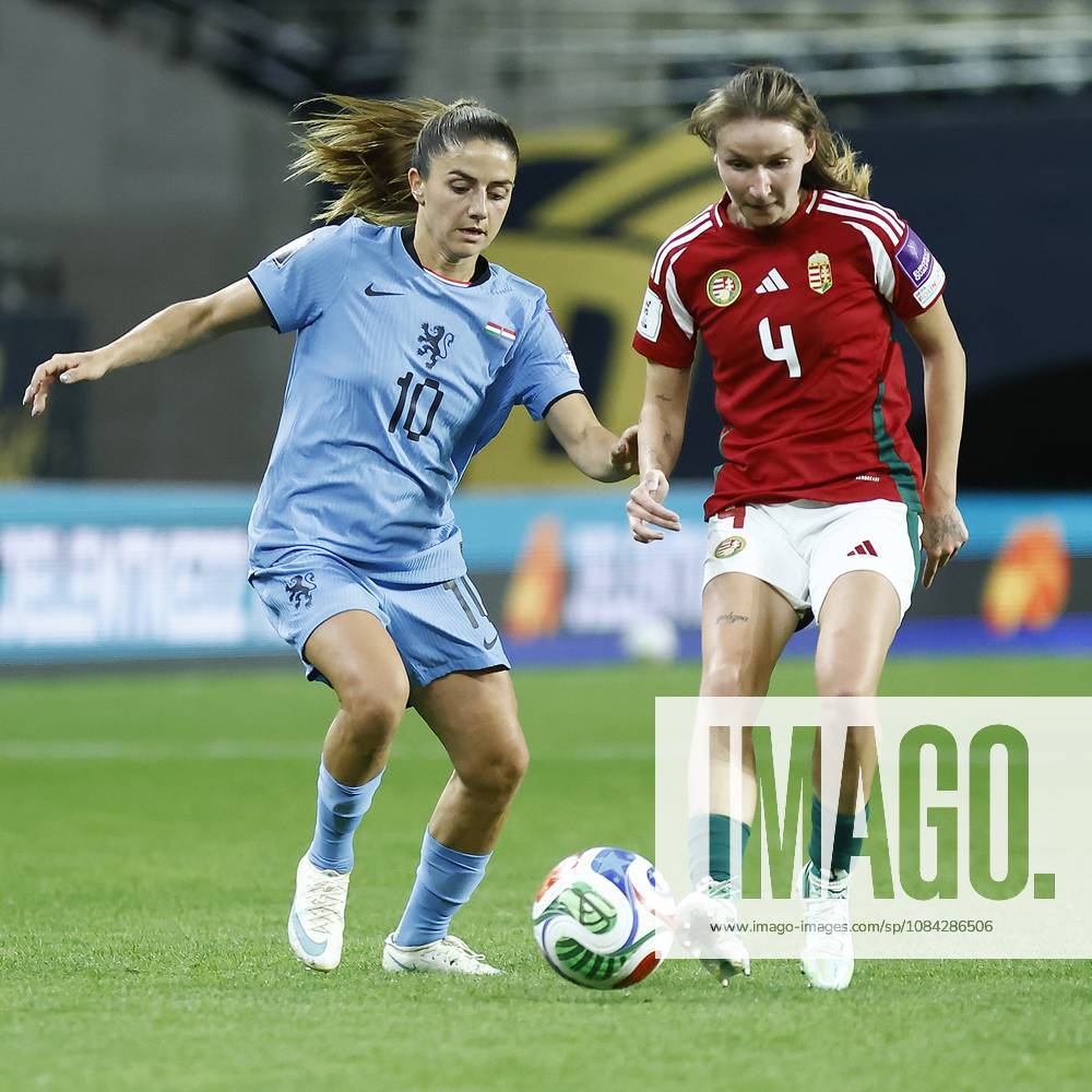 , Pancho Arena, season 2026 2027 , UEFA worldcup qualification football play-offs round 1 , match between Hungary and The Netherlands (women) 1st leg , Pictures shows Netherlands player Danielle van de Donk and Hungary player Sara Pusztai Hungary - Netherlands (women) x208078171x