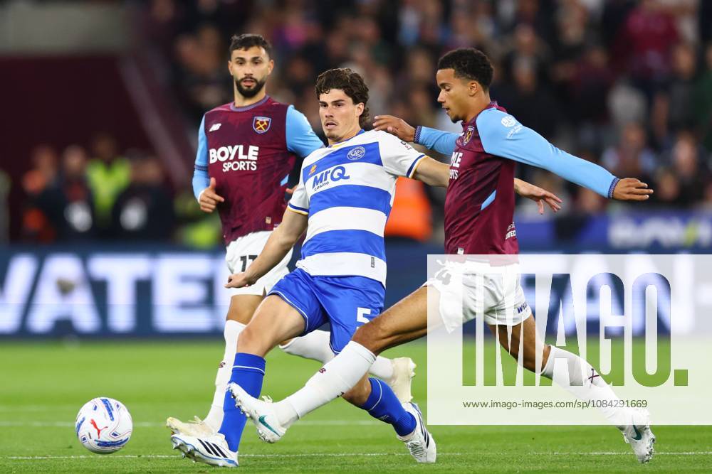 Ronnie Edwards of Queen Park Rangers under pressure from Divine Mukasa of West Ham United West Ham United v Queens Park Rangers, EFL Championship, Football, London Stadium, London, UK - 09 Oct 2026London London Stadium United Kingdom