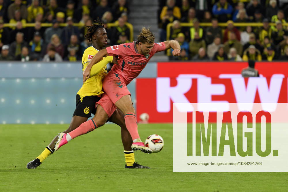 Joane Gadou (Borussia Dortmund) und Niclas Fuellkrug (SV Werder Bremen) im Kampf um den Ball waehrend des spiels der 1. Bundesliga zwischen Borussia Dortmund und SV Werder Bremen, Signal Iduna Park am 09. October 2026 in Dortmund, Deutschland. (Foto von Max Maiwald DeFodi Images) +++ Joane Gadou (Borussia Dortmund) und Niclas Fuellkrug (SV Werder Bremen) battle for the ball during the Bundesliga match between Borussia Dortmund and SV Werder Bremen at Signal Iduna Park on October 9, 2026 in Dortmund, Germany. (Photo by Max Maiwald DeFodi Images) DFB DFL REGULATIONS PROHIBIT ANY USE OF PHOTOGRAPHS AS IMAGE SEQUENCES AND OR QUASI-VIDEO. (Photo by Max Maiwald DeFodi Images) -