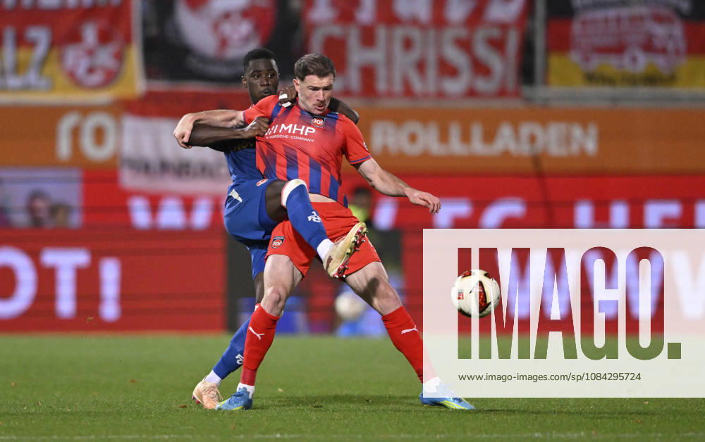 Zweikampf, Aktion Budu Zivzivadze Siwsiwadse 1. FC Heidenheim 1846 FCH (11) gegen Maxwell Gyamfi 1. FC Kaiserslautern FCK (04) 1. FC Heidenheim 1846 FCH vs 1. FC Kaiserslautern 09.10..2026 DFL REGULATIONS PROHIBIT ANY USE OF PHOTOGRAPHS AS IMAGE SEQUENCES AND OR QUASI-VIDEO 1. FC Heidenheim 1846 FCH vs 1. FC Kaiserslautern