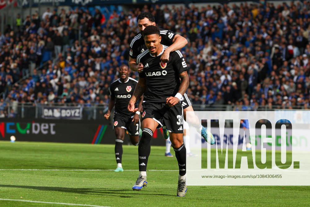 2026.10.10 Fussball 2.Bundesliga SV Darmstadt 98 - Energie Cottbus v.l., Tolcay Cigereci (Energie Cottbus) and Justin Butler (Energie Cottbus) seen celebrating after scoring goal to 0:1