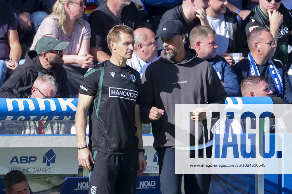 Torwarttrainer Michael Ratajczak (Hannover 96) und Trainer Sandro Wagner (Hannover 96) unterhalten sich waehrend des spiels der 2. Bundesliga zwischen 1. FC Magdeburg und Hannover 96, Avnet Arena am 10. October 2026 in Magdeburg, Deutschland. (Foto von Marco Steinbrenner DeFodi Images) +++ Torwarttrainer Michael Ratajczak (Hannover 96) und Trainer Sandro Wagner (Hannover 96) talk together during the 2nd Bundesliga match between 1. FC Magdeburg and Hannover 96 at Avnet Arena on October 10, 2026 in Magdeburg, Germany. (Photo by Marco Steinbrenner DeFodi Images) DFB DFL REGULATIONS PROHIBIT ANY USE OF PHOTOGRAPHS AS IMAGE SEQUENCES AND OR QUASI-VIDEO. (Photo by Marco Steinbrenner DeFodi Images) -