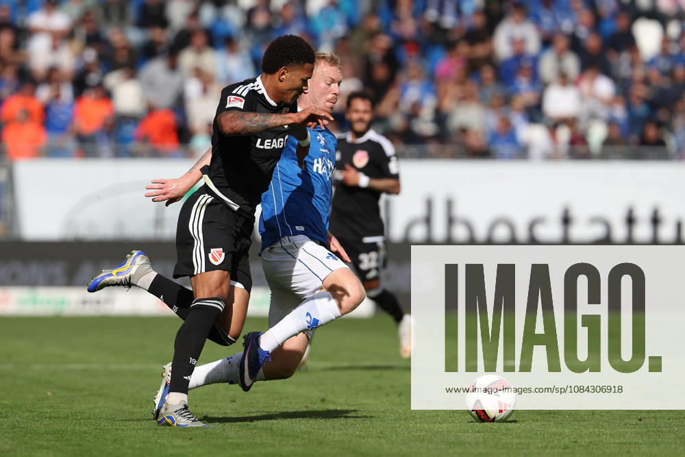 2026.10.10 Fussball 2.Bundesliga SV Darmstadt 98 - Energie Cottbus v.l., Justin Butler (Energie Cottbus), Kai Klefisch (SV Darmstadt 98), in action, with the ball
