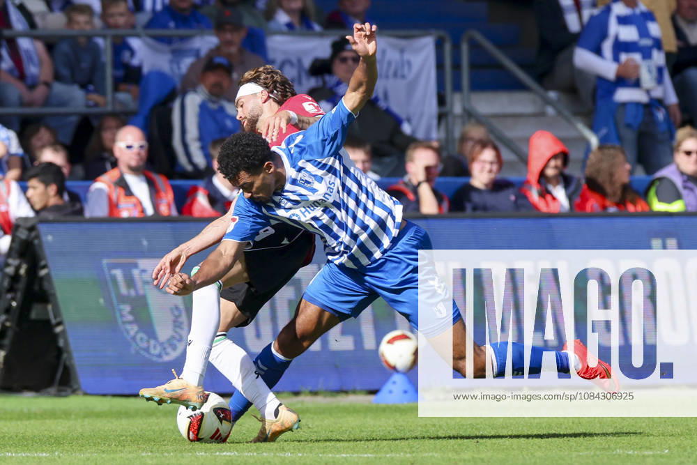 Emmanuel Iyoha (1. FC Magdeburg) und Kolja Oudenne (Hannover 96) kaempfen um den Ball waehrend des spiels der 2. Bundesliga zwischen 1. FC Magdeburg und Hannover 96, Avnet Arena am 10. October 2026 in Magdeburg, Deutschland. (Foto von Marco Steinbrenner DeFodi Images) +++ Emmanuel Iyoha (1. FC Magdeburg) und Kolja Oudenne (Hannover 96) battle for the ball during the 2nd Bundesliga match between 1. FC Magdeburg and Hannover 96 at Avnet Arena on October 10, 2026 in Magdeburg, Germany. (Photo by Marco Steinbrenner DeFodi Images) DFB DFL REGULATIONS PROHIBIT ANY USE OF PHOTOGRAPHS AS IMAGE SEQUENCES AND OR QUASI-VIDEO. (Photo by Marco Steinbrenner DeFodi Images) -