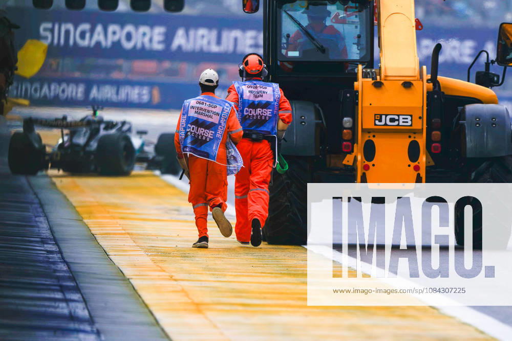 10th October 2026; Marina Bay, Singapore; Formula 1, Singapore Grand Prix, Sprint Race and Qualifying Day; George Russell (63) of Great Britain and Mercedes-AMG PETRONAS Formula One Team is unhurt but the emergency teams head to collect the wreckage DavidxAsh