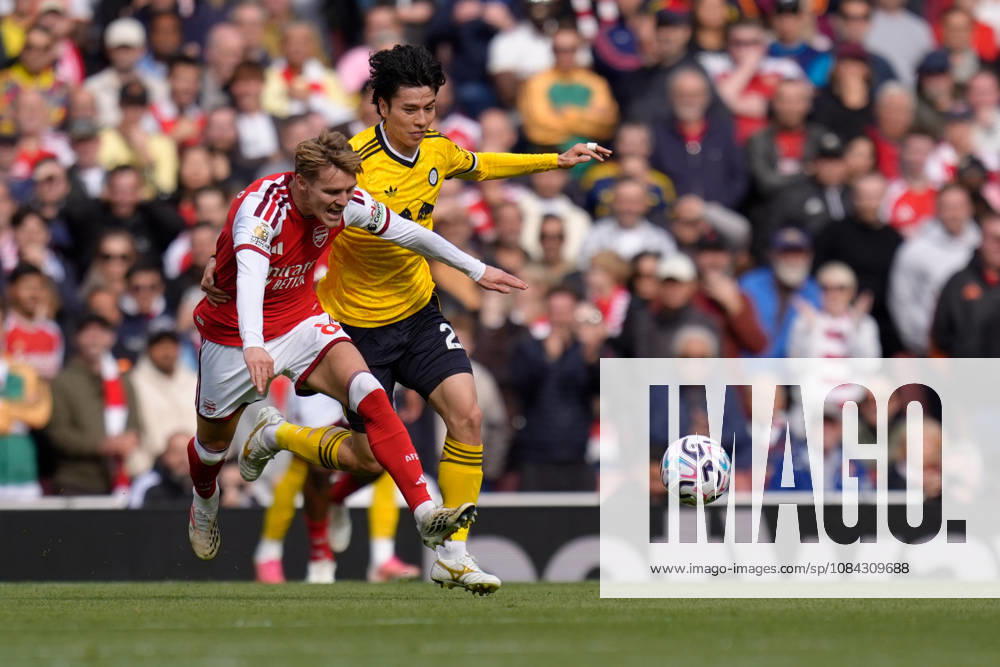 10th October 2026; Emirates Stadium, London, England; Premier League Football, Arsenal versus Leeds United; Martin Odegaard of Arsenal is challenged by Ao Tanaka of Leeds United TomxMajor