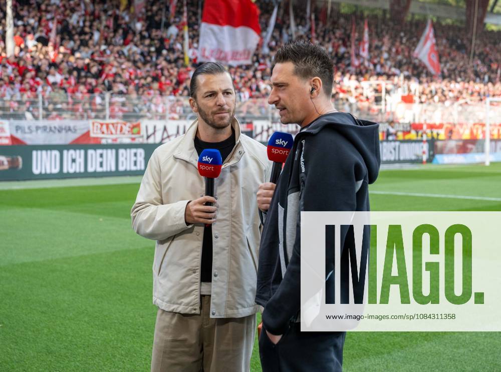 Fußball, Herren, Saison 2026 2027, 1. Bundesliga (5. Spieltag), 1. FC Union Berlin - SV 07 Elversberg, v. l. Riccardo Basile (Sky), Trainer Vincent Wagner (SV Elversberg) , 10.10.2026,