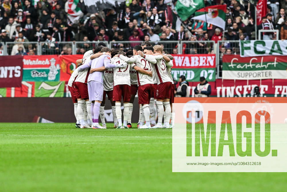 AUGSBURG, GERMANY; 10. OCTOBER: the Team of Augsburg before the Bundesliga Match between FC Augsburg vs. FC Bayern Munich at Matchday 5 at WWK-Arena DFL REGULATIONS PROHIBIT ANY USE OF PHOTOGRAPHS AS IMAGE SEQUENCES AND OR QUASI-VIDEO