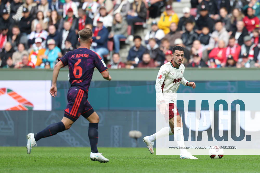 Arijon Ibrahimovic (FC Augsburg, 21) mit Joshua Kimmich (FC Bayern Muenchen, 06), GER, FC Augsburg vs. FC Bayern Muenchen, Fussball, Bundesliga, 5. Spieltag, Saison 2026 2027, 10.10.2026, , GER, FC Augsburg vs. FC Bayern Muenchen, Fussball, Bundesliga, 5. Spieltag, Saison 2026 2027, 10.10.2026 Augsburg