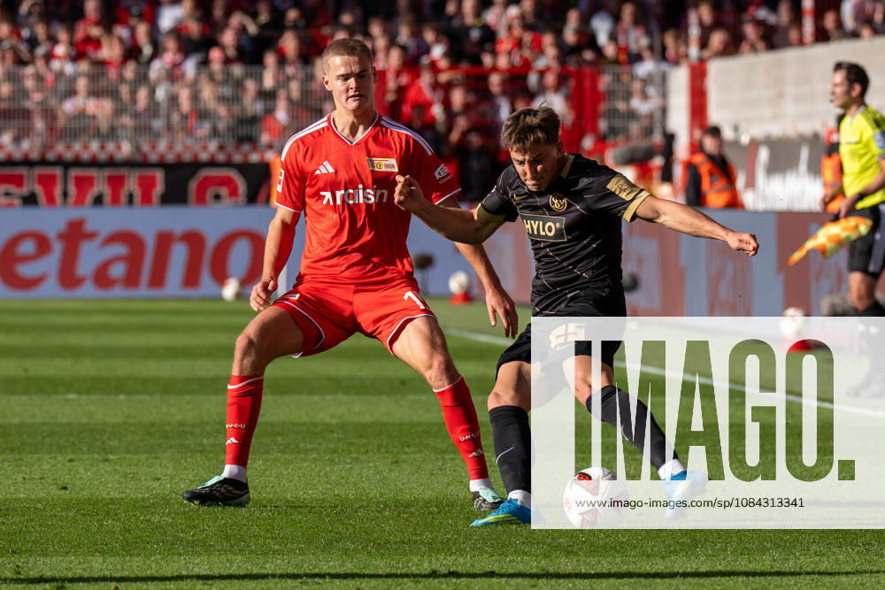 Deutschland: Fussball 1. Bundesliga, 5. Spieltag 2026 2027, 1.FC Union Berlin - SV Elversberg am 10.10.2026 in Berlin (Stadion An der Alten Försterei): Lukas Petkov (SV Elversberg, 25) und Tom Rothe (1. FC Union Berlin, 15)