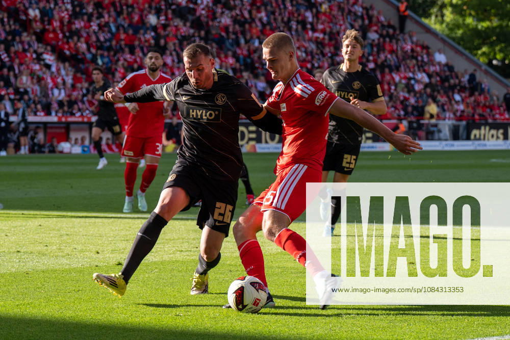 Deutschland: Fussball 1. Bundesliga, 5. Spieltag 2026 2027, 1.FC Union Berlin - SV Elversberg am 10.10.2026 in Berlin (Stadion An der Alten Försterei): Zweikampf Luca Sirch (SV Elversberg, 26) und Tom Rothe (1. FC Union Berlin, 15)