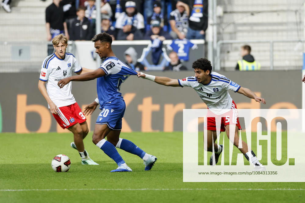 Bambase Conte (TSG Hoffenheim, 20) und Martin Adeline (Hamburger SV, 05) im Zweikampf , Deutschland, Fussball, 1. Bundesliga, 5.Spieltag, 2026 2027, TSG Hoffenheim vs. Hamburger SV, 10.10.2026, Sinsheim SNP Arena Deutschland