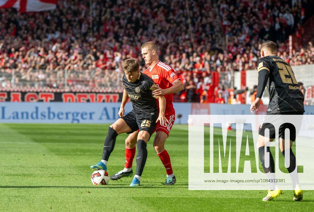 Fußball, Herren, Saison 2026 2027, 1. Bundesliga (5. Spieltag), 1. FC Union Berlin - SV 07 Elversberg, v. l. Lukas Petkov (SV Elversberg) , Tom Rothe (1. FC Union Berlin), Lasse Günther (SV Elversberg), 10.10.2026,