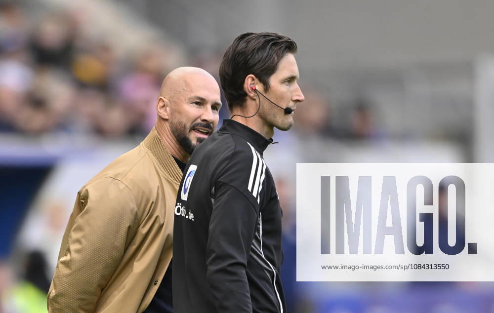 Trainer Coach Christian Ilzer TSG 1899 Hoffenheim sauer im Gespraech Diskussion mit Vierter Offizieller Schiedsrichter Referee Schiedsrichter Referee Dr. Matthias Joellenbeck nach Verletzung Ozan Kabak TSG 1899 Hoffenheim (05) Schiedsrichter Referee Harm Osmers schickt Betreuer wegen Kopfverletzung vom Fels TSG 1899 Hoffenheim vs Hamburger SV HSV 10.10.2026 DFL REGULATIONS PROHIBIT ANY USE OF PHOTOGRAPHS AS IMAGE SEQUENCES AND OR QUASI-VIDEO TSG 1899 Hoffenheim vs Hamburger SV HSV