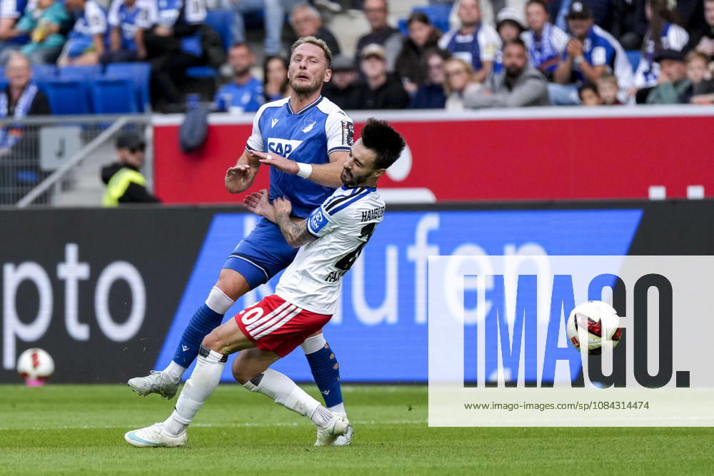 V.li.: Wouter Burger (Hoffenheim, 18) mit Bodycheck gegen Fabio Vieira (HSV, 20), Zweikampf, Spielszene, Duell, duel, tackle, tackling, Dynamik, Action, Aktion, 10.10.2026, Sinsheim (Deutschland), Fussball, Bundesliga, TSG 1899 Hoffenheim - Hamburger SV, DFB DFL REGULATIONS PROHIBIT ANY USE OF PHOTOGRAPHS AS IMAGE SEQUENCES AND OR QUASI-VIDEO.