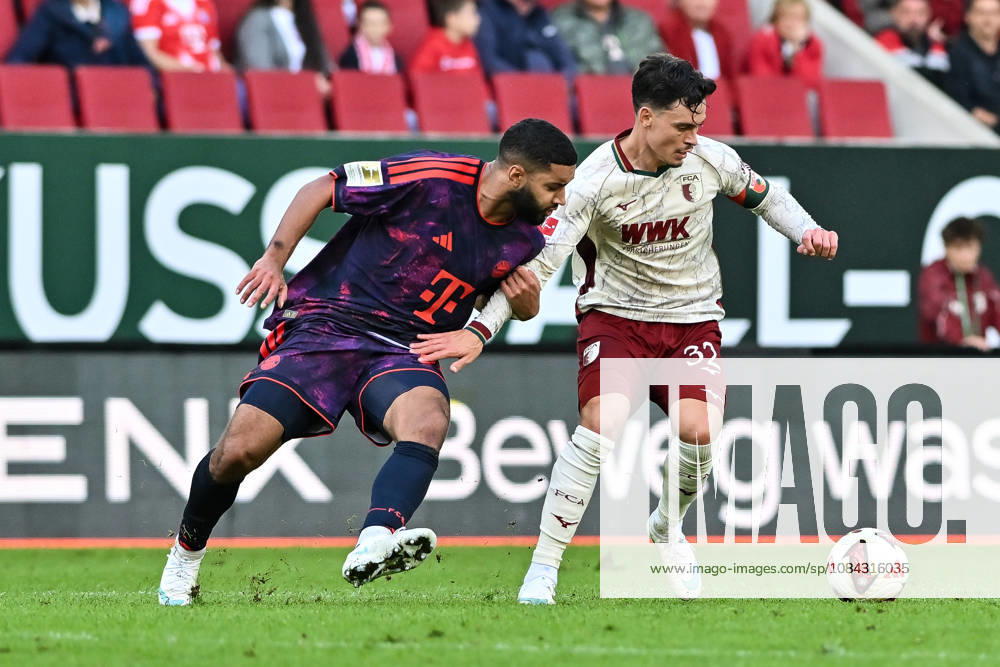 AUGSBURG, GERMANY; 10. OCTOBER: tackle between Ismael SAIBARI (FC Bayern Munich 34) and Fabian RIEDER (FC Augsburg 32) during the Bundesliga Match between FC Augsburg vs. FC Bayern Munich at Matchday 5 at WWK-Arena DFL REGULATIONS PROHIBIT ANY USE OF PHOTOGRAPHS AS IMAGE SEQUENCES AND OR QUASI-VIDEO
