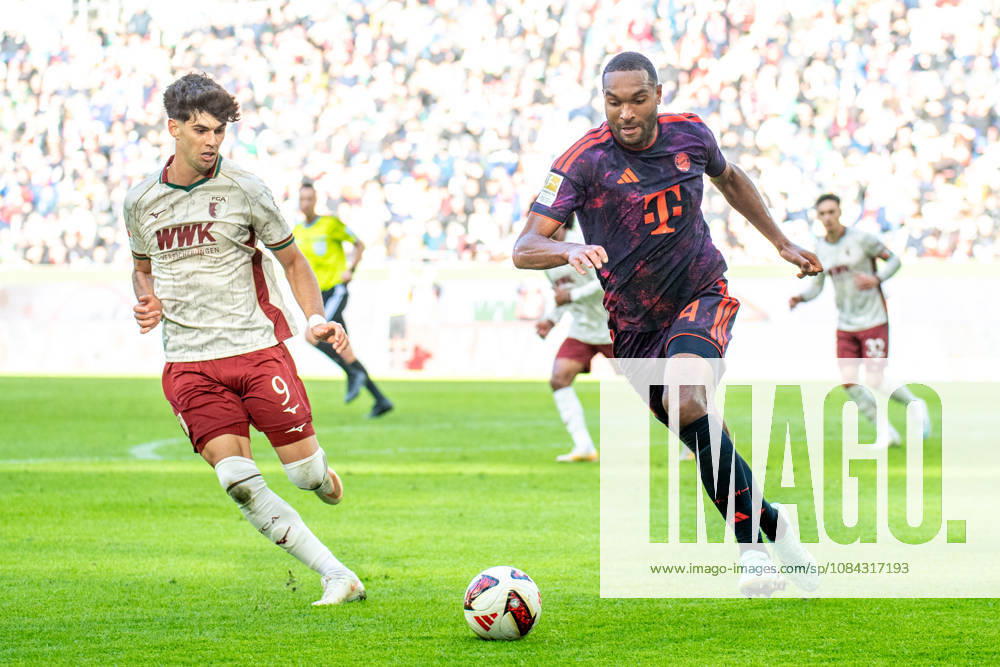 Rodrigo Ribeiro (9 Augsburg) und Jonathan Tah (4 Bayern) in Aktion beim Bundesligaspiel FC Augsburg - FC Bayern München am 10.10.2026.