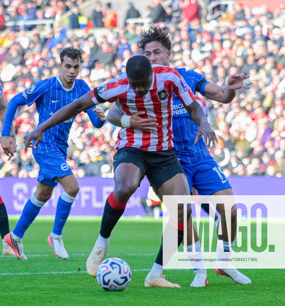 Sunderland v Brighton, Premier League, Football, Stadium Of Light, Sunderland UK - 10 Oct 2026 Sunderland battling with Charalampos Kostoulas of Brighton & Hove Albion Football Club Sunderland Stadium Of Light Tyne and Wear UK, UK NEWSPAPERS OUT