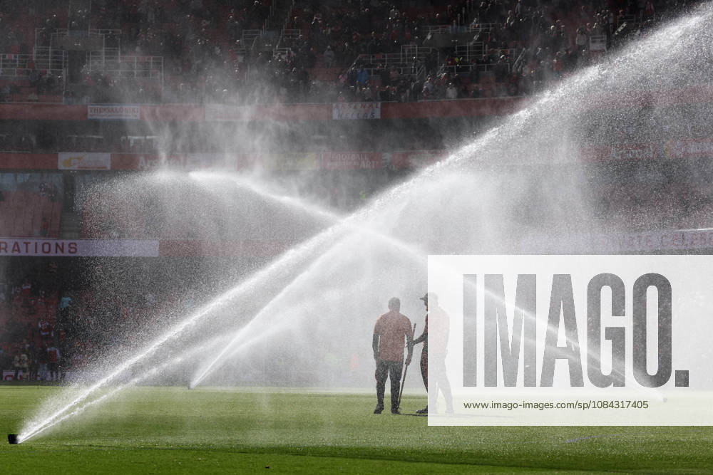 Arsenal v Leeds United 10 October 2026, London - Premier League Football - Arsenal v Leeds United - Groundskeepers stand amongst the pitch sprinklers - Photo: Charlotte Wilson Offside. London UK