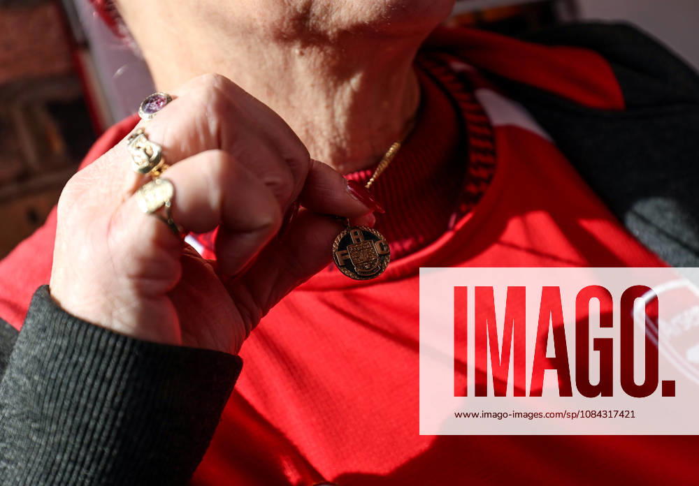 Arsenal v Leeds United 10 October 2026, London - Premier League Football - Arsenal v Leeds United - An Arsenal fan shows off her necklace - Photo: Charlotte Wilson Offside. London UK