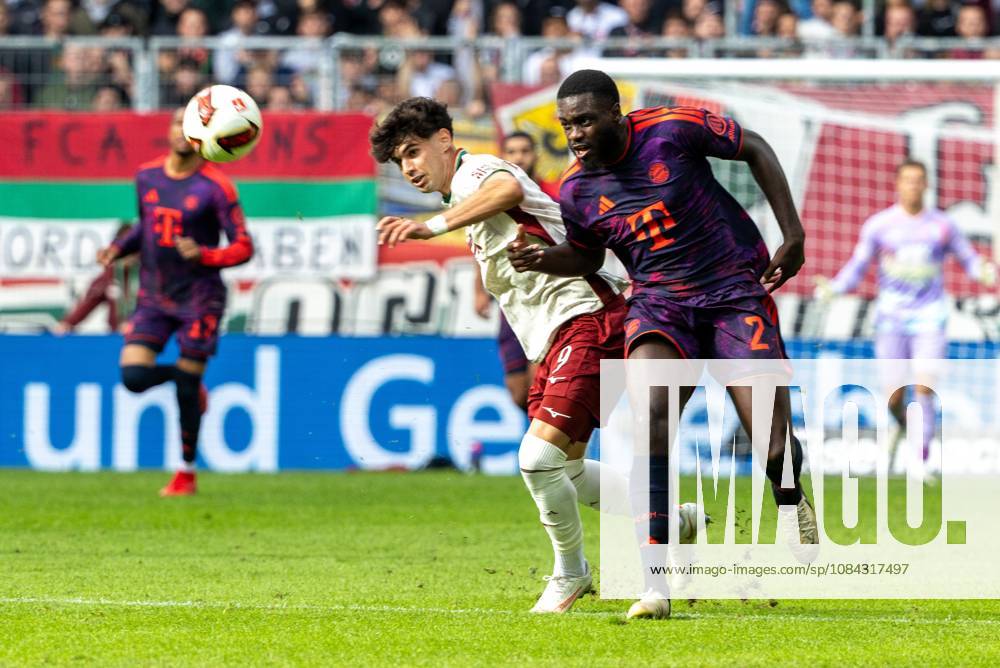 Rodrigo Ribeiro (FC Augsburg) und Dayot Upamecano (FC Bayern Muenchen) v-l im Zweikampf, FC Augsburg vs. FC Bayer Muenchen, Fussball-Bundesliga, Fussball, 1. Bundesliga, 5. Spieltag, 10.10..2026 DFL regulations prohibit any use of photographs as image sequences and or quasi-video