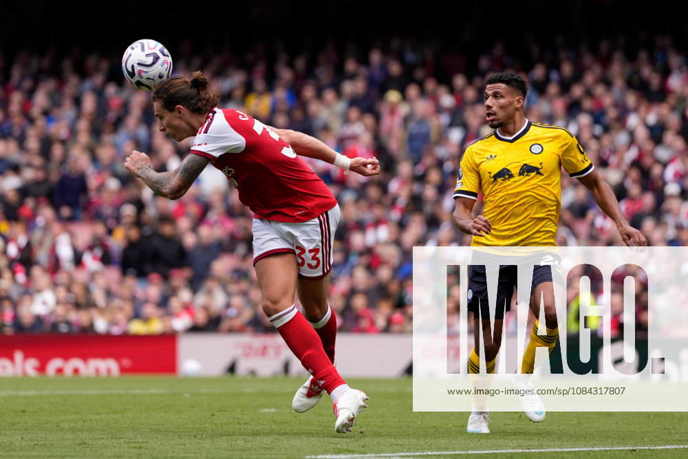 10th October 2026; Emirates Stadium, London, England; Premier League Football, Arsenal versus Leeds United; Riccardo Calafiori of Arsenal heads the ball TomxMajor