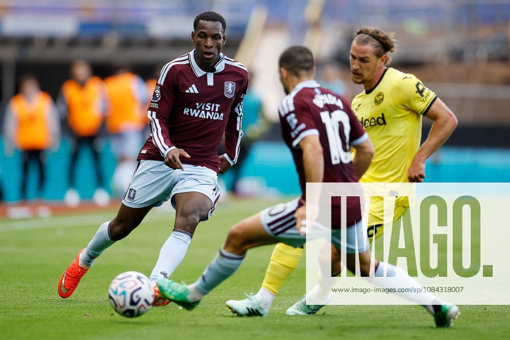 Nicolas Jackson of Aston Villa passes the ball to Emi Buendia of Aston Villa whilst under pressure from Yehor Yarmolyuk of Brentford Aston Villa v Brentford, Premier League, Football, Villa Park, Birmingham, UK - 10 Oct 2026Birmingham Villa Park United Kingdom