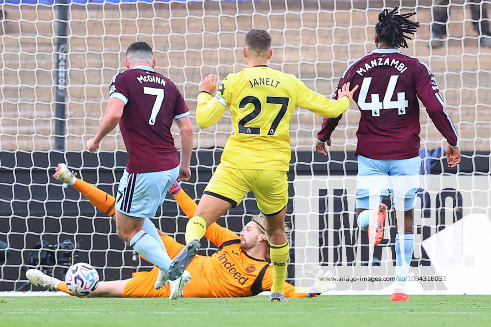 Aston Villa v Brentford, Premier League Caoimhin Kelleher of Brentford FC saves a shot by John McGinn of Aston Villa during the Aston Villa v Brentford Premier League match at Villa Park, Birmingham, England on 10 October 2026 Credit: Ryan Crockett Every Second Media Editorial use only. All images are copyright Every Second Media Limited. No images may be reproduced without prior permission. All rights reserved. Premier League and Football League images are subject to licensing agreements with Football DataCo Limited. see https: www.football-dataco.com