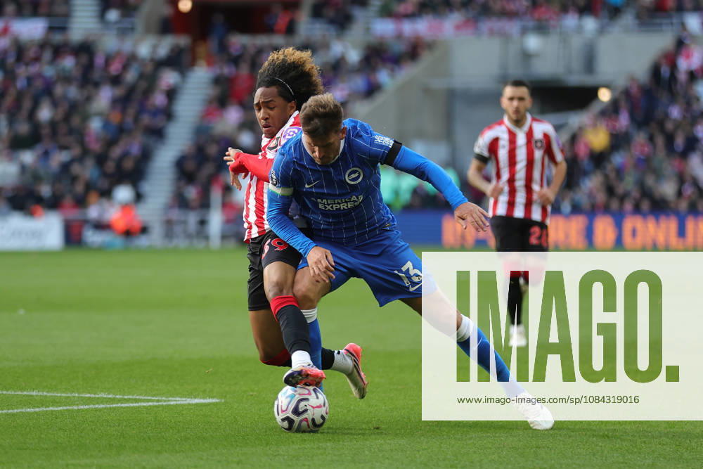 10th October 2026; Stadium of Light, Sunderland, England; Premier League Football, Sunderland versus Brighton and Hove Albion; Malick Fofana of Sunderland makes a tackle on Pascal Gross of Brighton and Hove Albion DavexLofthouse