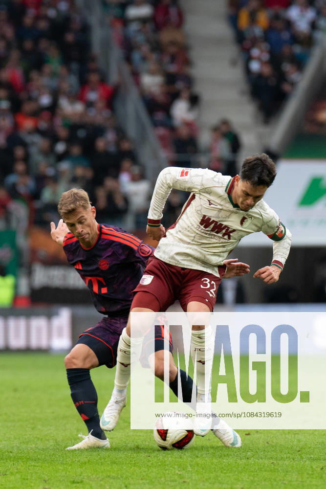 Joshua Kimmich (6 Bayern) und Fabian Rieder (32 Augsburg) in Aktion beim Bundesligaspiel FC Augsburg - FC Bayern München am 10.10.2026.
