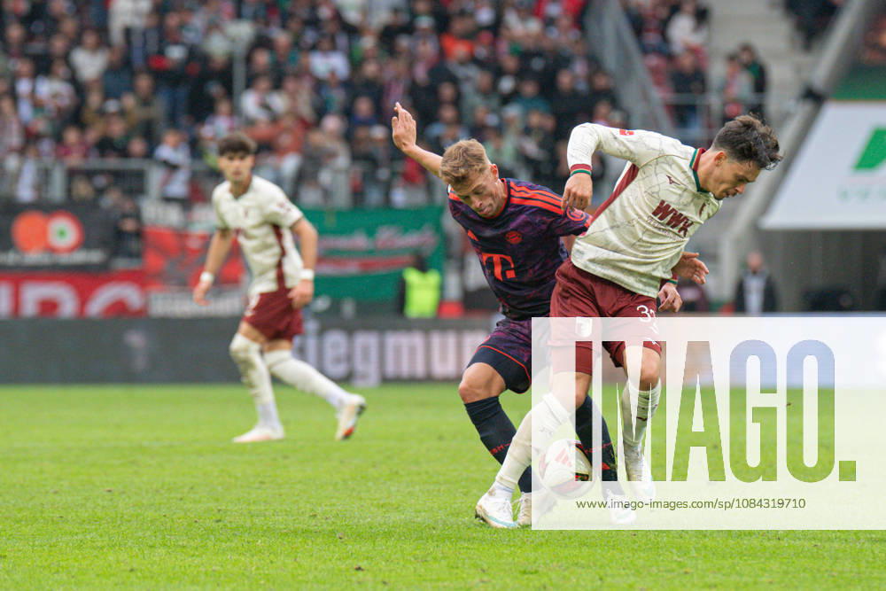 Joshua Kimmich (6 Bayern) und Fabian Rieder (32 Augsburg) in Aktion beim Bundesligaspiel FC Augsburg - FC Bayern München am 10.10.2026.