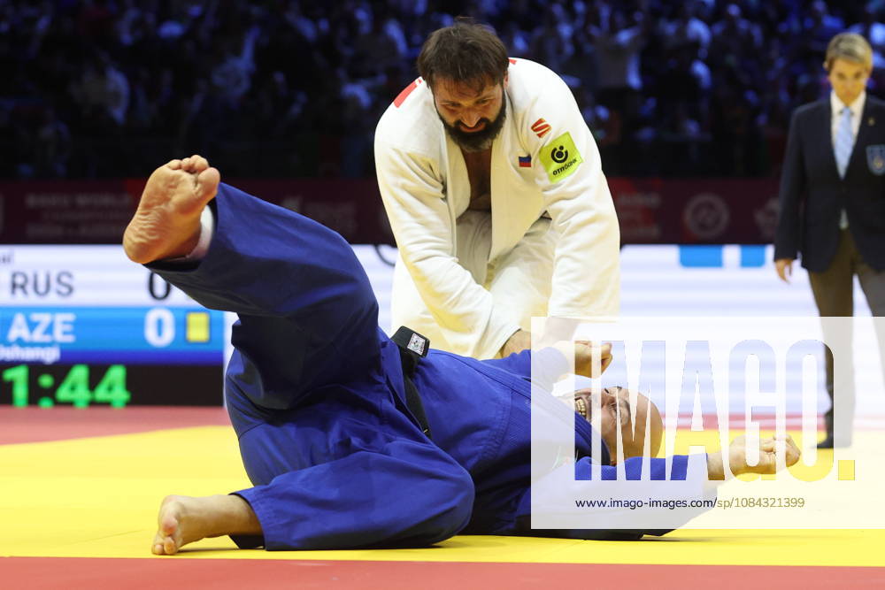AZERBAIJAN, BAKU - OCTOBER 10, 2026: Russia s Inal Tasoev (standing) and Azerbaijan s Ushangi Kokauri fight in their heavyweight bout during the 2026 World Judo Championships at the National Gymnastics Arena. Mikhail Sinitsyn TASS 99048435