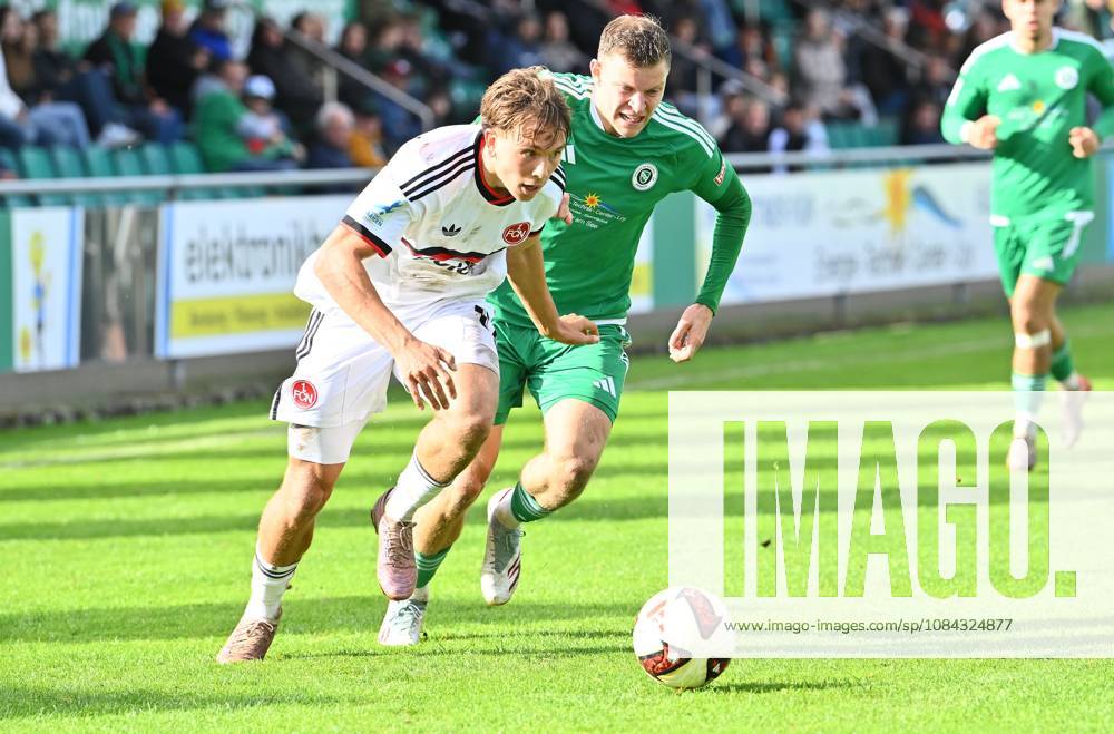 Fussball - Saison 2026 2027 - Regionalliga Bayern - 04. Spieltag: SpVgg Ansbach - 1. FC Nürnberg FCN II ( Club ) - DoGe - - Moritz Wiezorrek (17, 1. FC Nürnberg FCN II ) Riko Manz (29, SpVgg Ansbach )