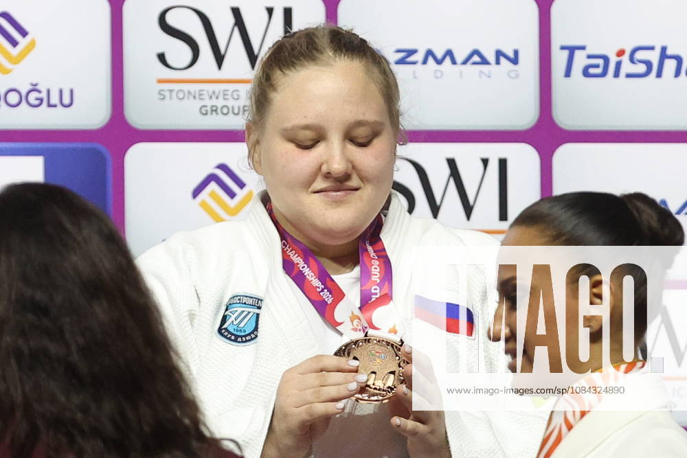 AZERBAIJAN, BAKU - OCTOBER 10, 2026: Russia s Maria Ivanova celebrates her gold medal during a victory ceremony for the women s heavyweight event as the 2026 World Judo Championships takes place at the National Gymnastics Arena. Mikhail Sinitsyn TASS 99050280